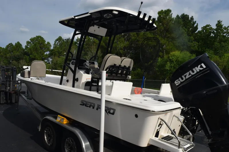 Slide: The Image of 2022 Sea Pro 228 Bay boat with Suzuki outboard motor on trailer. - 6