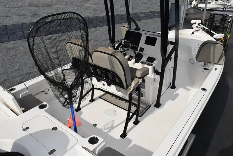 Slide: The Image of 2022 Sea Pro 228 Bay boat interior with fishing net and console. - 7
