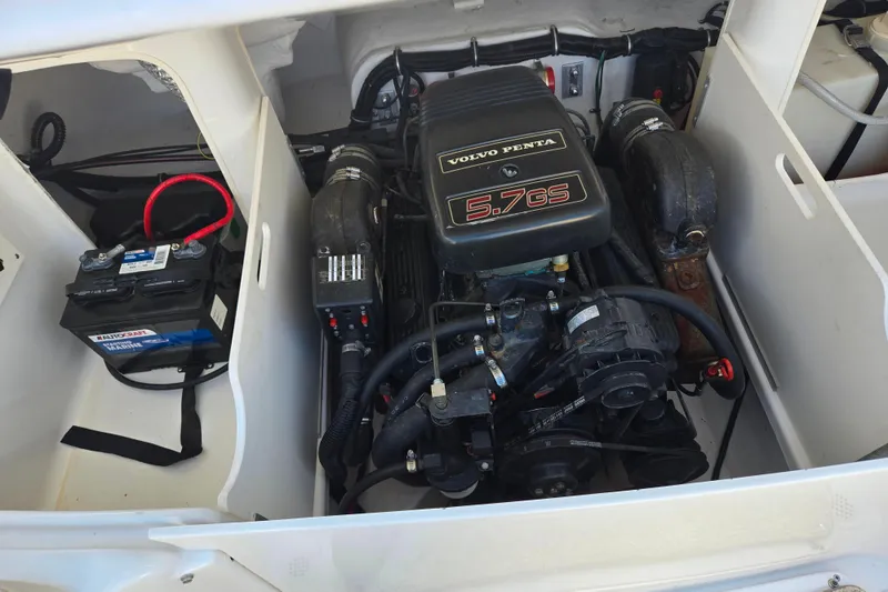 Slide: The Image of 1998 Chris-Craft 210 Bowrider engine compartment with Volvo Penta 5.7GS engine. - 24