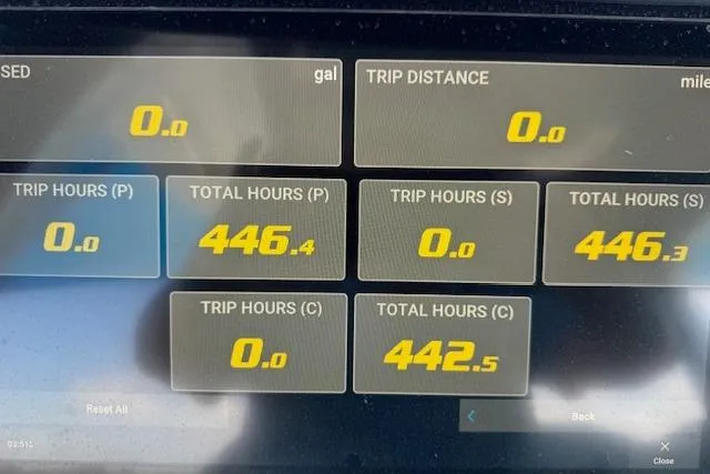 Slide: The Image of Display screen of 2023 Edgewater 370CC showing trip and total hours data. - 26