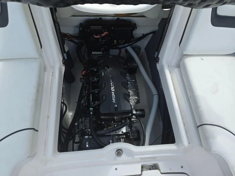Slide: The Image of 2015 Yamaha Boats SX190 engine compartment, showcasing high output engine components. - 23