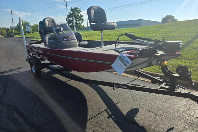 Slide: The Image of 2023 Tracker Bass Tracker Classic XL boat on trailer, parked outdoors. - 5