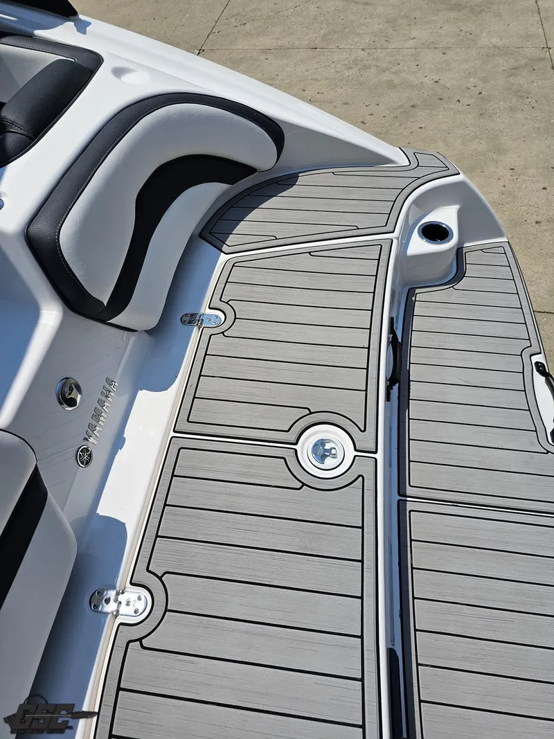 Slide: The Image of 2022 Yamaha Boats 195S deck with sleek seating and modern design. - 35