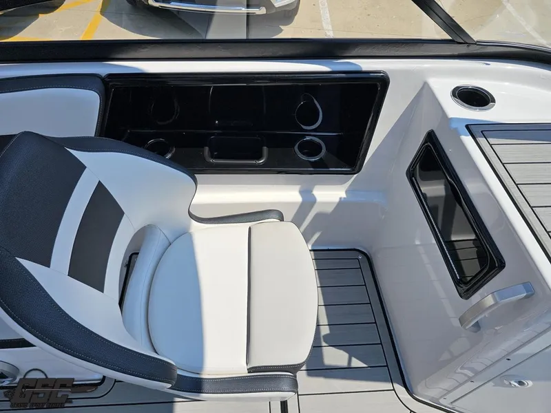 Slide: The Image of 2022 Yamaha Boats 195S interior with sleek seating and modern dashboard design. - 46