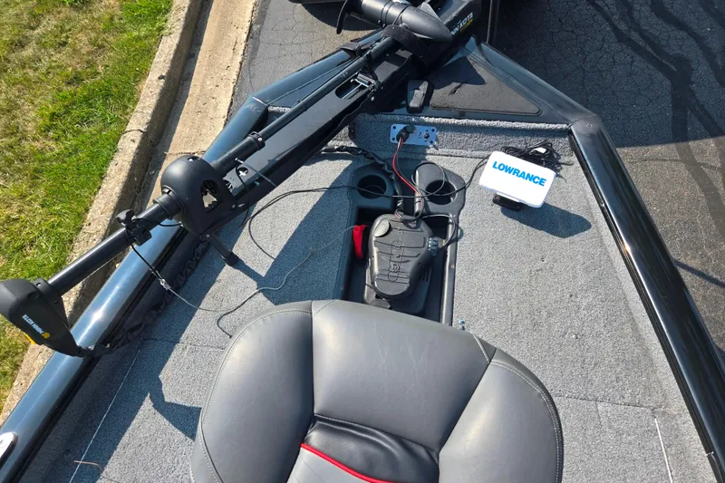 Slide: The Image of 2023 Tracker Pro Team 175 TXW boat deck with Lowrance fish finder and Minn Kota trolling motor. - 17