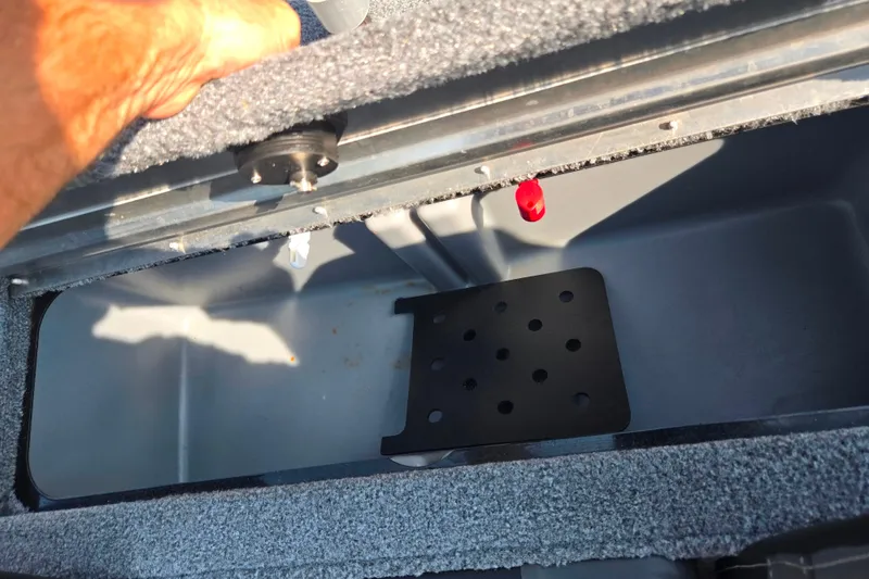 Slide: The Image of 2023 Tracker Pro Team 175 TXW livewell interior with hand opening lid. - 24