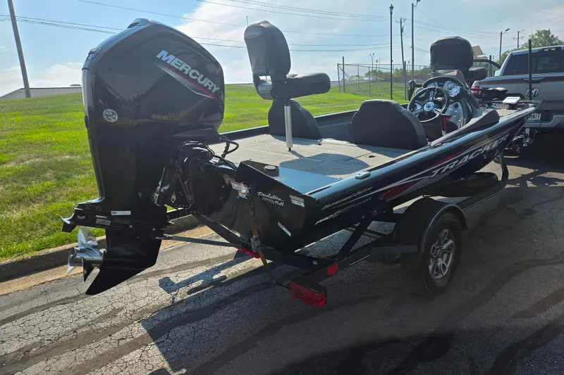 Slide: The Image of 2023 Tracker Pro Team 175 TXW boat with Mercury engine on trailer. - 3