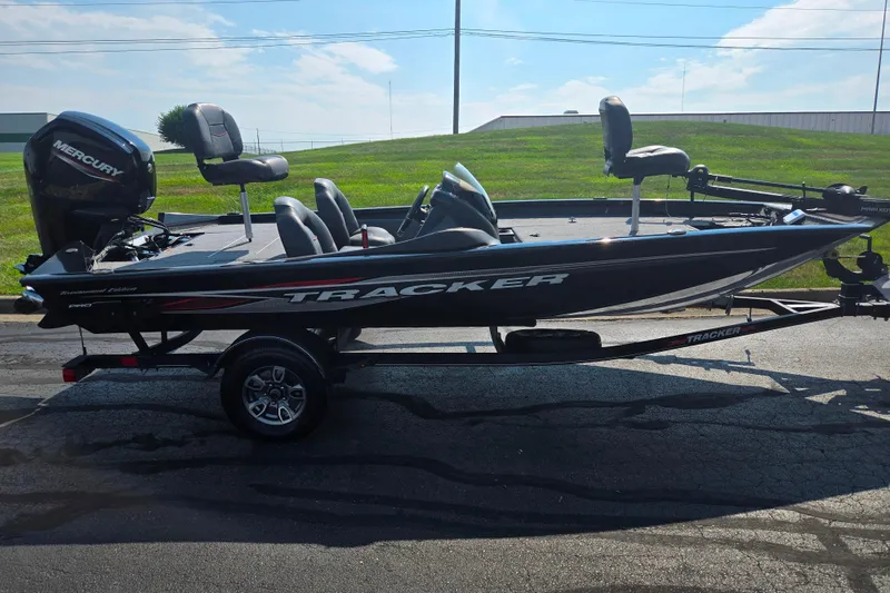 Slide: The Image of 2023 Tracker Pro Team 175 TXW fishing boat on trailer, side view. - 4