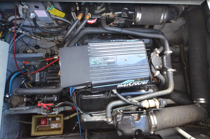 Slide: The Image of Engine compartment of 1990 Sea Ray 350 Sundancer Coupe with MerCruiser engine. - 24