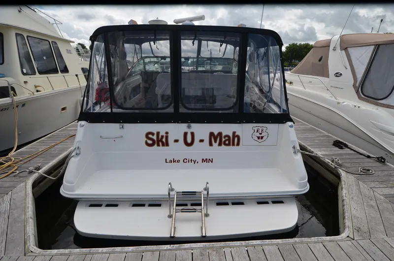 Slide: The Image of 1990 Sea Ray 350 Sundancer Coupe docked, named "Ski-U-Mah," Lake City, MN. - 3