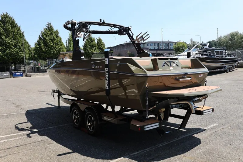 Slide: The Image of 2023 ATX Surf Boats 22 Type-S on trailer in parking lot, rear view. - 10