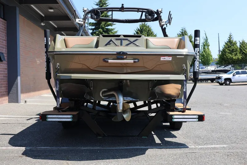 Slide: The Image of 2023 ATX Surf Boats 22 Type-S, rear view, parked outdoors. - 13