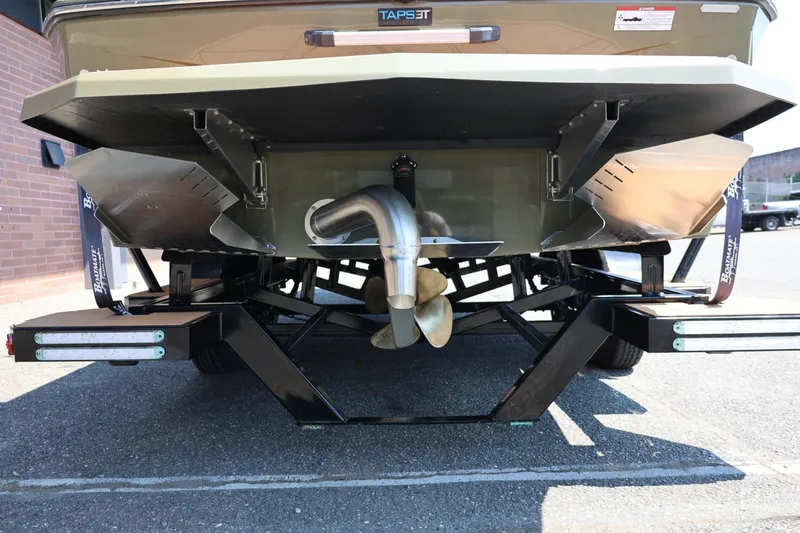 Slide: The Image of 2023 ATX Surf Boats 22 Type-S rear view, showcasing propeller and hull design. - 16