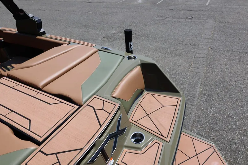 Slide: The Image of 2023 ATX Surf Boats 22 Type-S, tan and green interior, geometric design, rear view. - 20