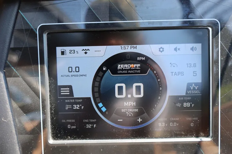 Slide: The Image of ATX Surf Boats 2023 dashboard display showing speed, temperature, and fuel levels. - 34