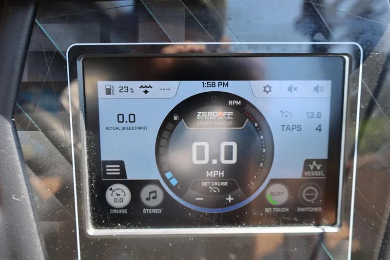 Slide: The Image of 2023 ATX Surf Boats 22 Type-S dashboard display showing speed and settings. - 38