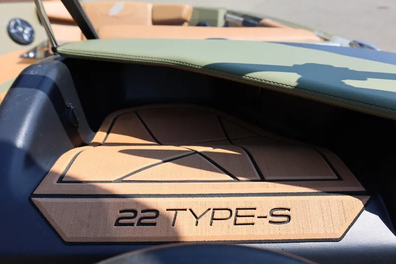 Slide: The Image of 2023 ATX Surf Boats 22 Type-S interior detail with custom flooring and dashboard. - 39