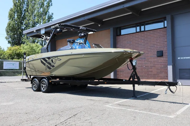Slide: The Image of 2023 ATX Surf Boats 22 Type-S on trailer, parked outdoors. - 4