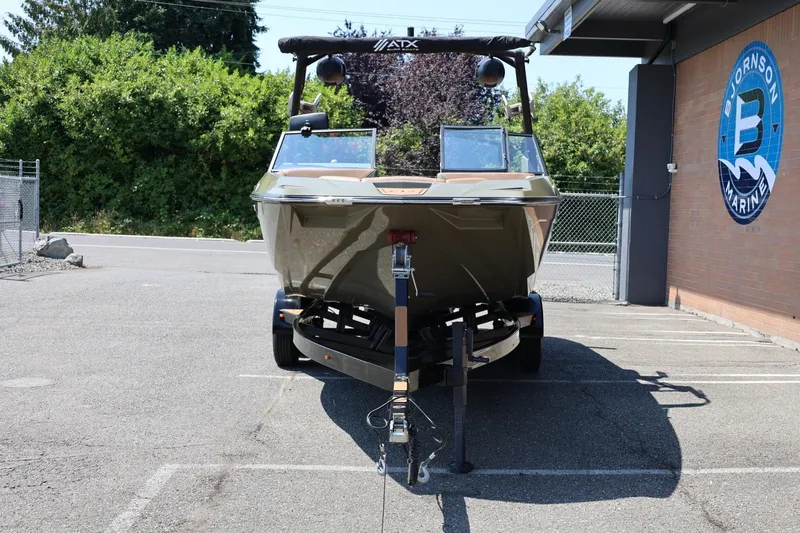 Slide: The Image of 2023 ATX Surf Boats 22 Type-S parked at Bjornson Marine dealership. - 5