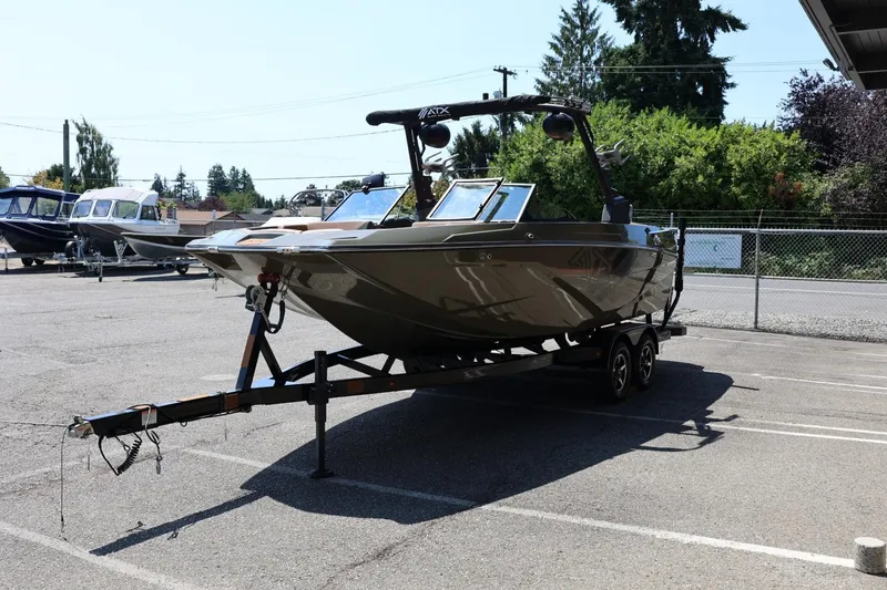 Slide: The Image of 2023 ATX Surf Boats 22 Type-S on trailer in parking lot. - 7