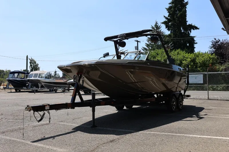 Slide: The Image of 2023 ATX Surf Boats 22 Type-S on trailer in parking lot. - 8
