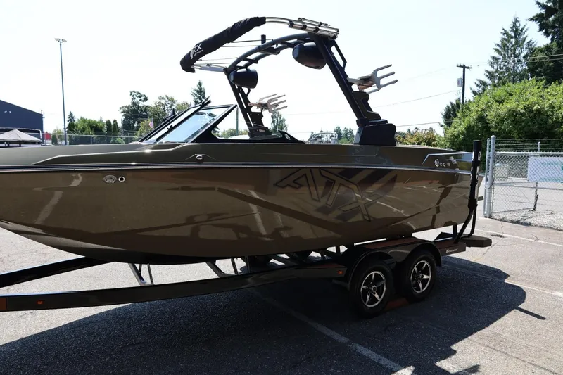 Slide: The Image of 2023 ATX Surf Boats 22 Type-S on trailer, parked outdoors. - 9