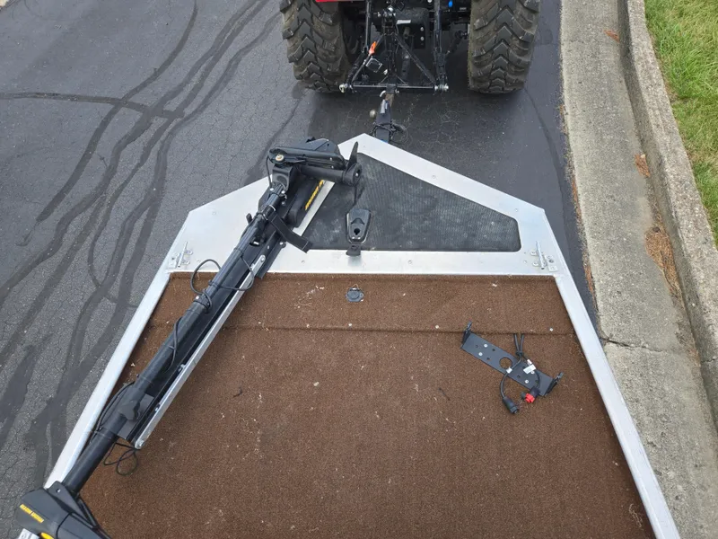 Slide: The Image of 2018 Tracker Bass Tracker boat with trolling motor, parked on asphalt near curb. - 15