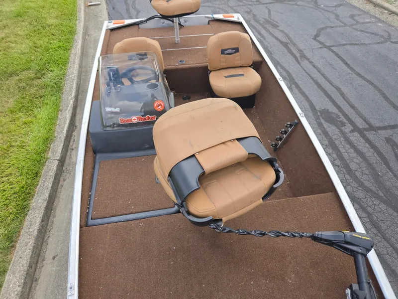 Slide: The Image of 2018 Tracker Bass Tracker 40th Anniversary Heritage Edition boat with tan seats and brown flooring. - 17