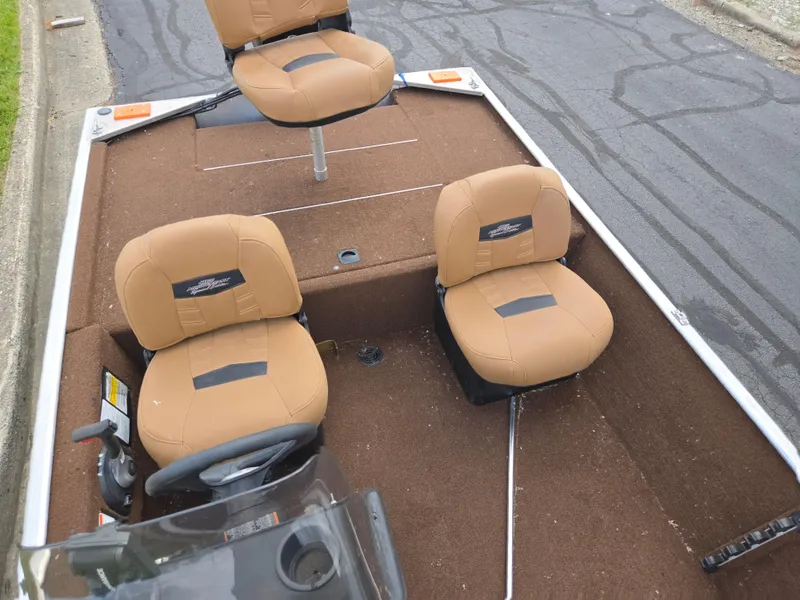 Slide: The Image of 2018 Tracker Bass Tracker 40th Anniversary Heritage Edition boat interior with tan seats. - 18