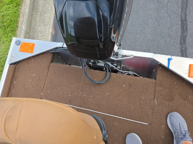 Slide: The Image of 2018 Tracker Bass Tracker 40th Anniversary Heritage Edition boat with motor and carpeted deck. - 22