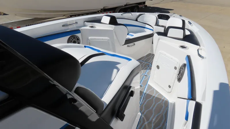 Slide: The Image of 2023 Sunsation 32 CCX boat interior with modern seating and sleek design. - 16