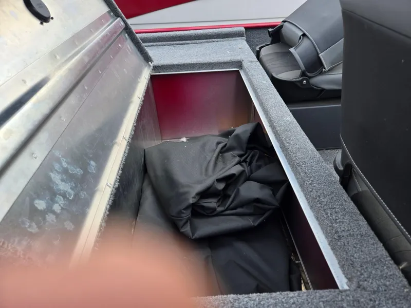 Slide: The Image of Open storage compartment in 2024 Tracker Bass Tracker Classic XL boat. - 21