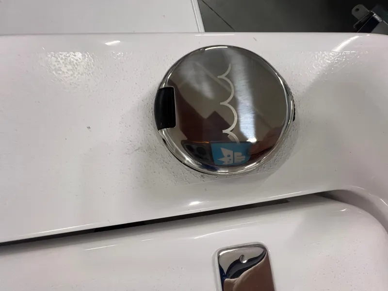 Slide: The Image of Chrome fuel cap on 2026 Blackfin 242 HB boat. - 11