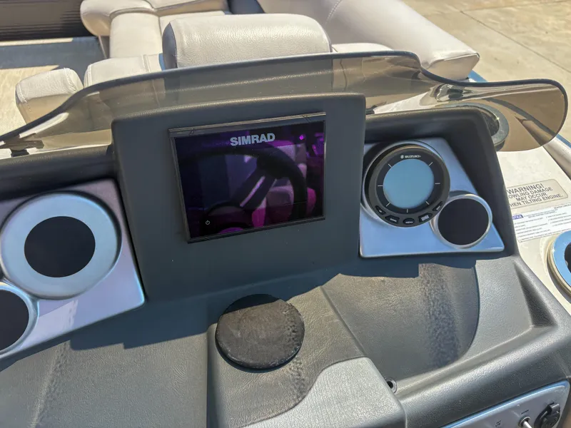 Slide: The Image of Dashboard of 2018 Silver Wave 250 Grand Costa CL with Simrad display and controls. - 12