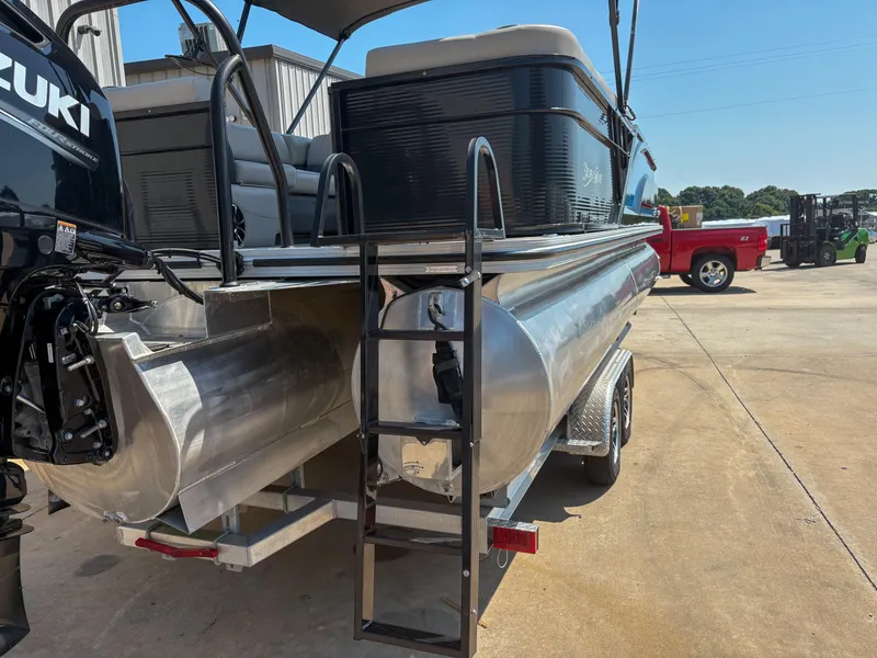 Slide: The Image of 2018 Silver Wave 250 Grand Costa CL pontoon boat with Suzuki outboard motor on trailer. - 4