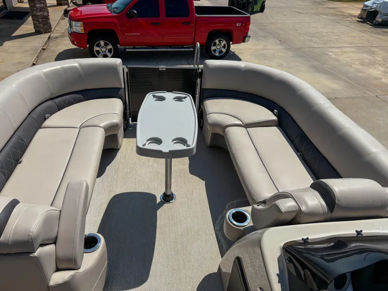 Slide: The Image of Interior of 2018 Silver Wave 250 Grand Costa CL pontoon boat with seating and table. - 6