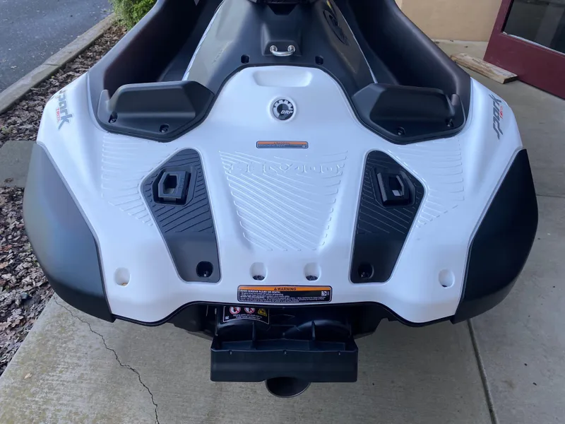 Slide: The Image of 2024 Sea-Doo Spark Trixx rear view, showcasing sleek design and features. - 7