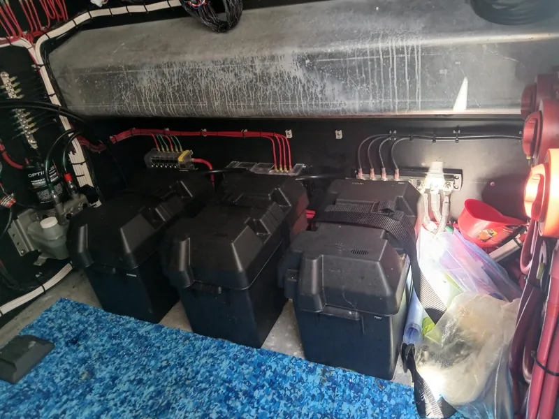 Slide: The Image of Electrical system setup in a 2023 Razor Cat 37 Cat boat, featuring battery boxes and wiring. - 7
