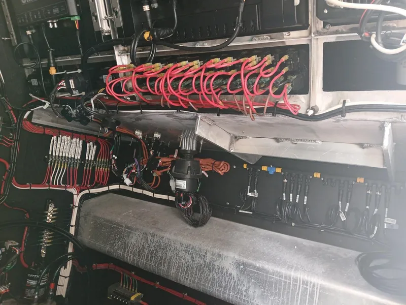 Slide: The Image of Electrical wiring and components inside a 2023 Razor Cat 37 Cat boat. - 8