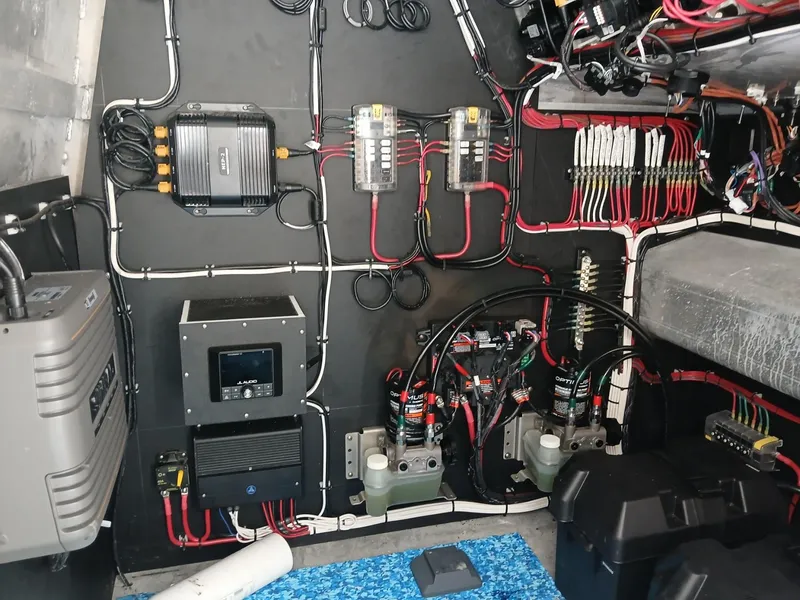 Slide: The Image of Electrical system setup in a 2023 Razor Cat 37 Cat boat, featuring organized wiring and components. - 9