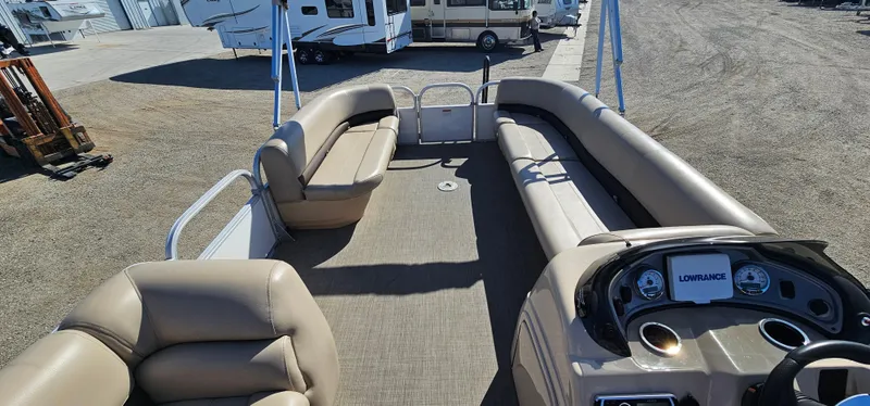 Slide: The Image of 2017 Sun Tracker Party Barge 240 pontoon boat with spacious seating and modern dashboard. - 6
