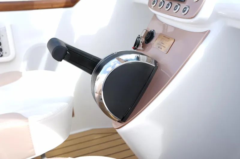 Slide: The Image of Boat throttle control on a Car Off-shore Fiat 500 Rose Gold, 2026 model. - 22