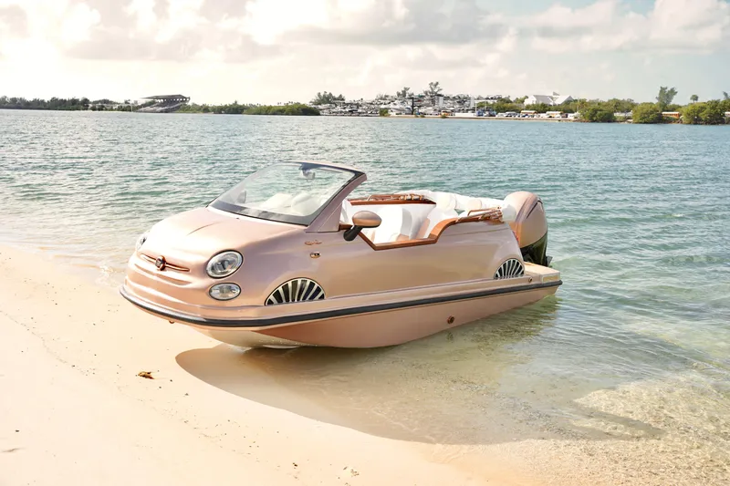 Slide: The Image of Rose gold Fiat 500 boat on sandy beach, 2026 model, by Car Off-shore. - 28