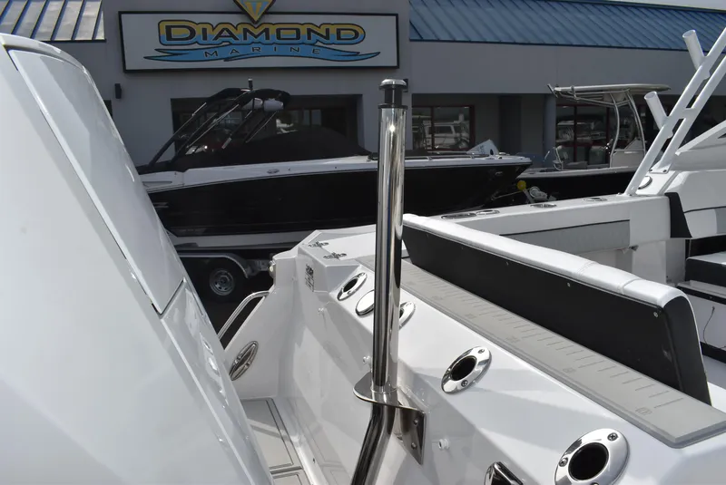 Slide: The Image of 2025 Blackfin 272 DC boat at Diamond Marine dealership, showcasing sleek design and modern features. - 15