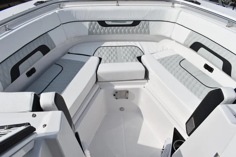Slide: The Image of Luxurious seating area on 2025 Blackfin 272 DC boat with elegant upholstery design. - 7