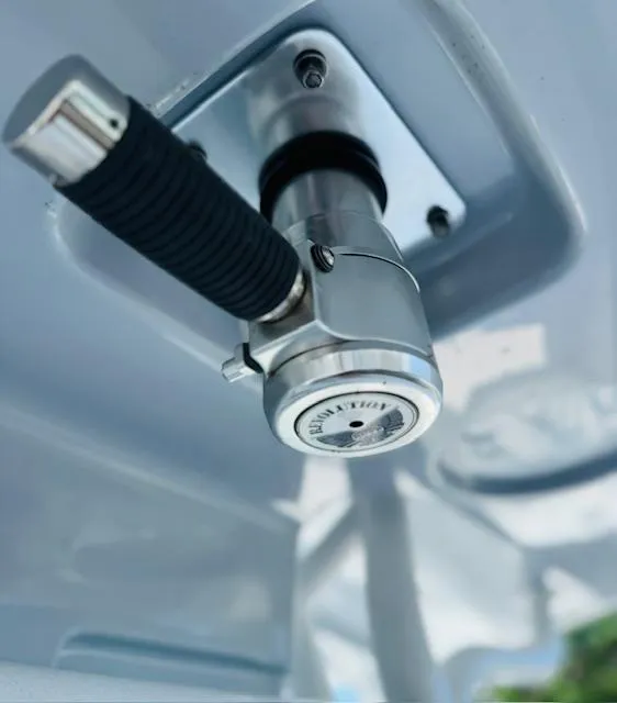 Slide: The Image of Close-up of a 2025 Cape Horn 34 T boat component, featuring a sleek metallic handle. - 21