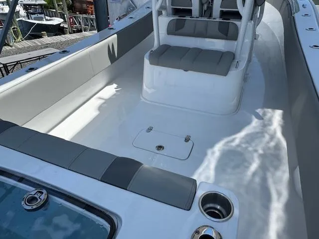 Slide: The Image of 2025 Cape Horn 34 T boat interior with seating and storage compartments. - 6