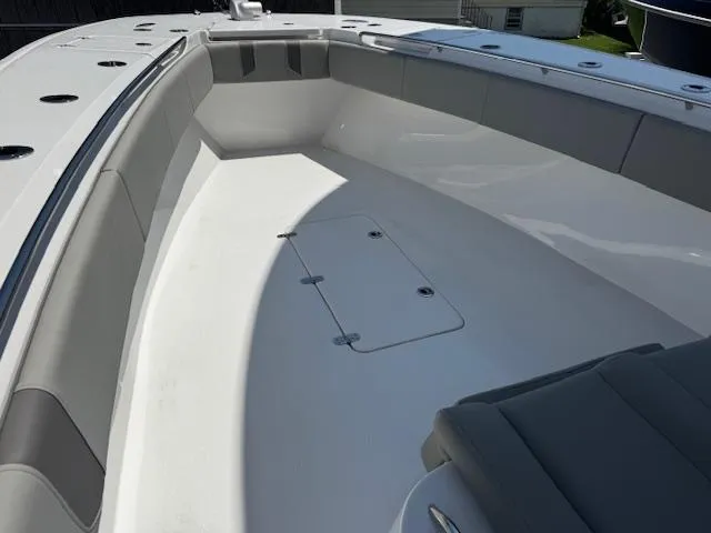 Slide: The Image of 2025 Cape Horn 34 T boat interior with spacious seating and storage. - 16