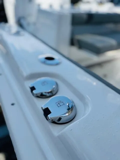 Slide: The Image of Close-up of 2025 Cape Horn 34 T boat's chrome fittings on white surface. - 22