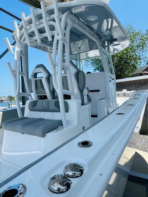 Slide: The Image of 2025 Cape Horn 34 T boat with sleek design and modern seating. - 5